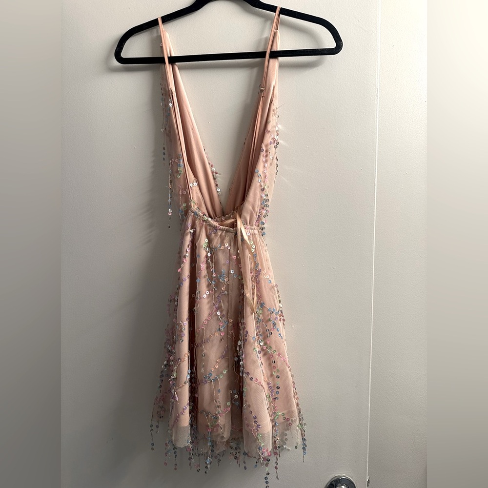 Sparkly light pink and cream sparkly, deep v dress.